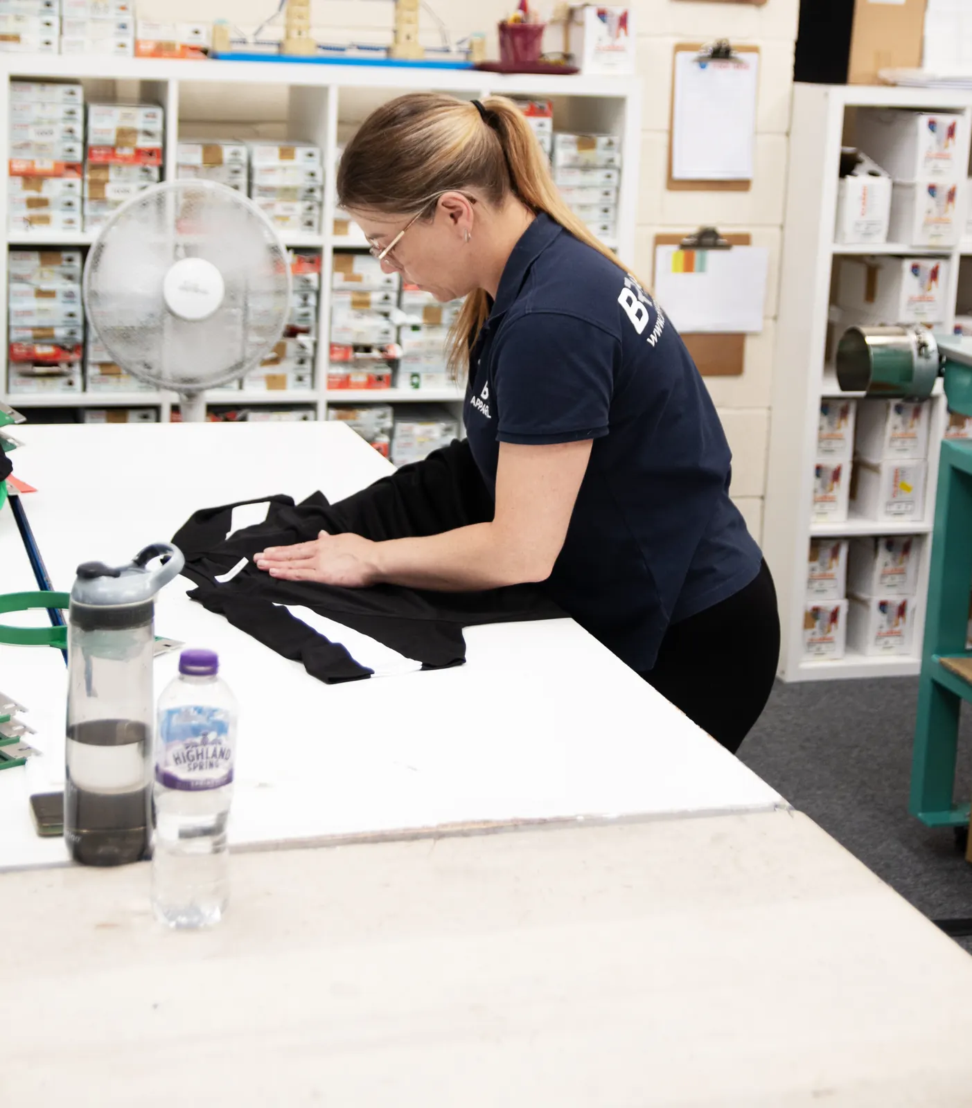 Branded garments prepared at the BR Apparel bench in Bradford for a Halifax order