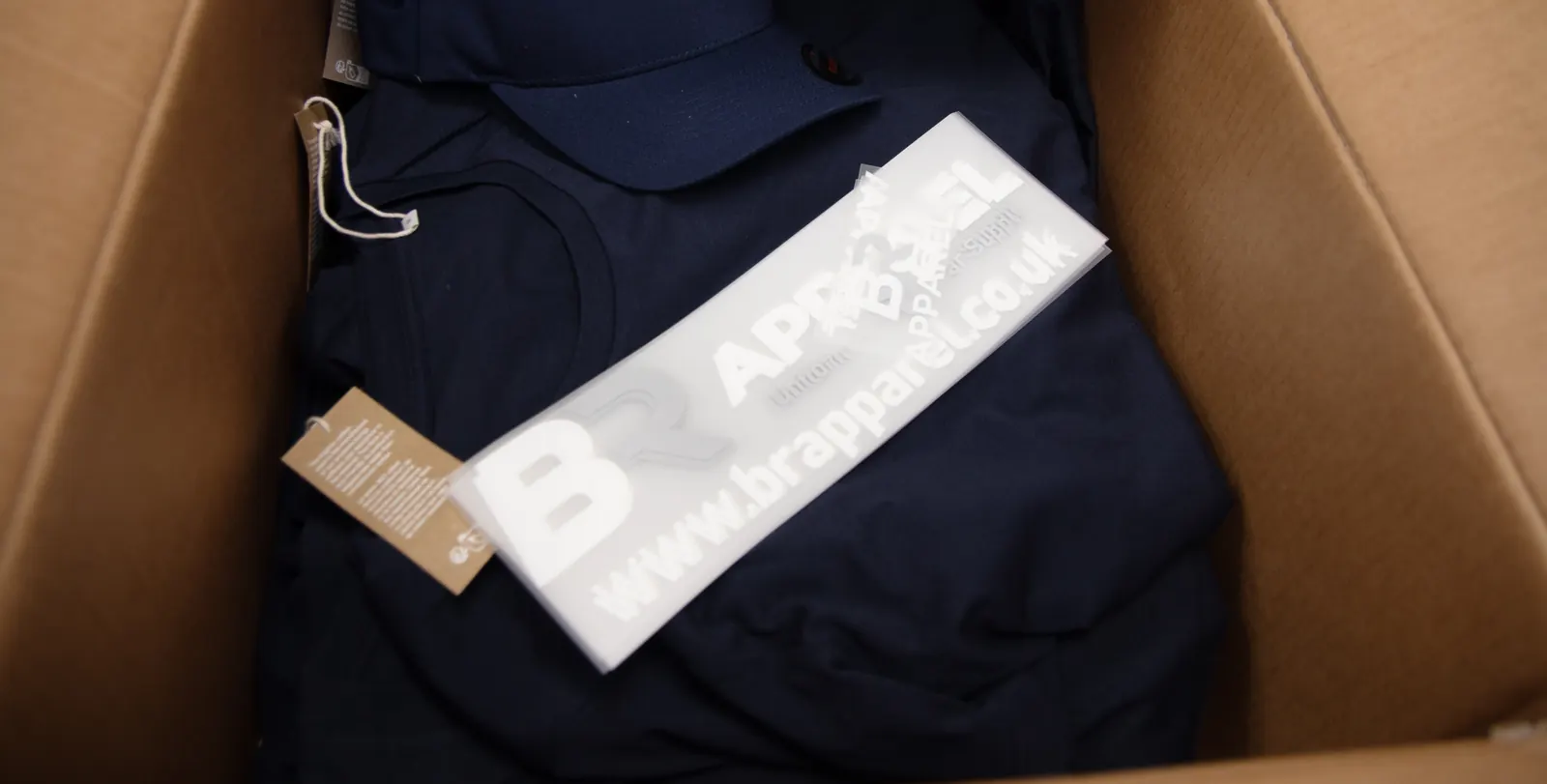 Approved uniform order boxed for dispatch at BR Apparel in Bradford