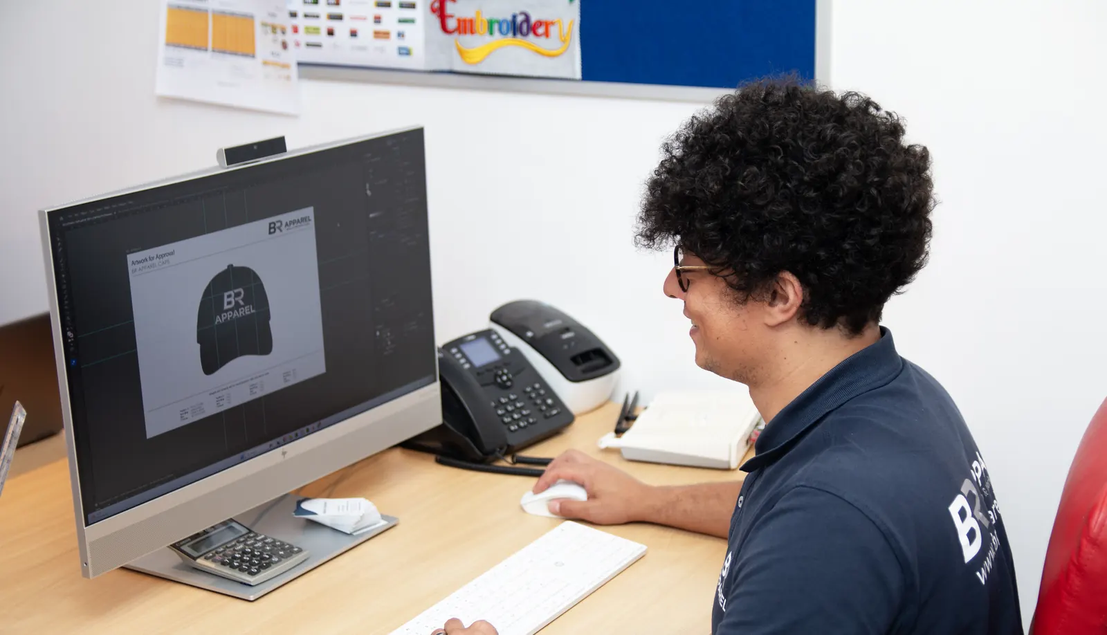 Logo artwork being digitised on screen at BR Apparel