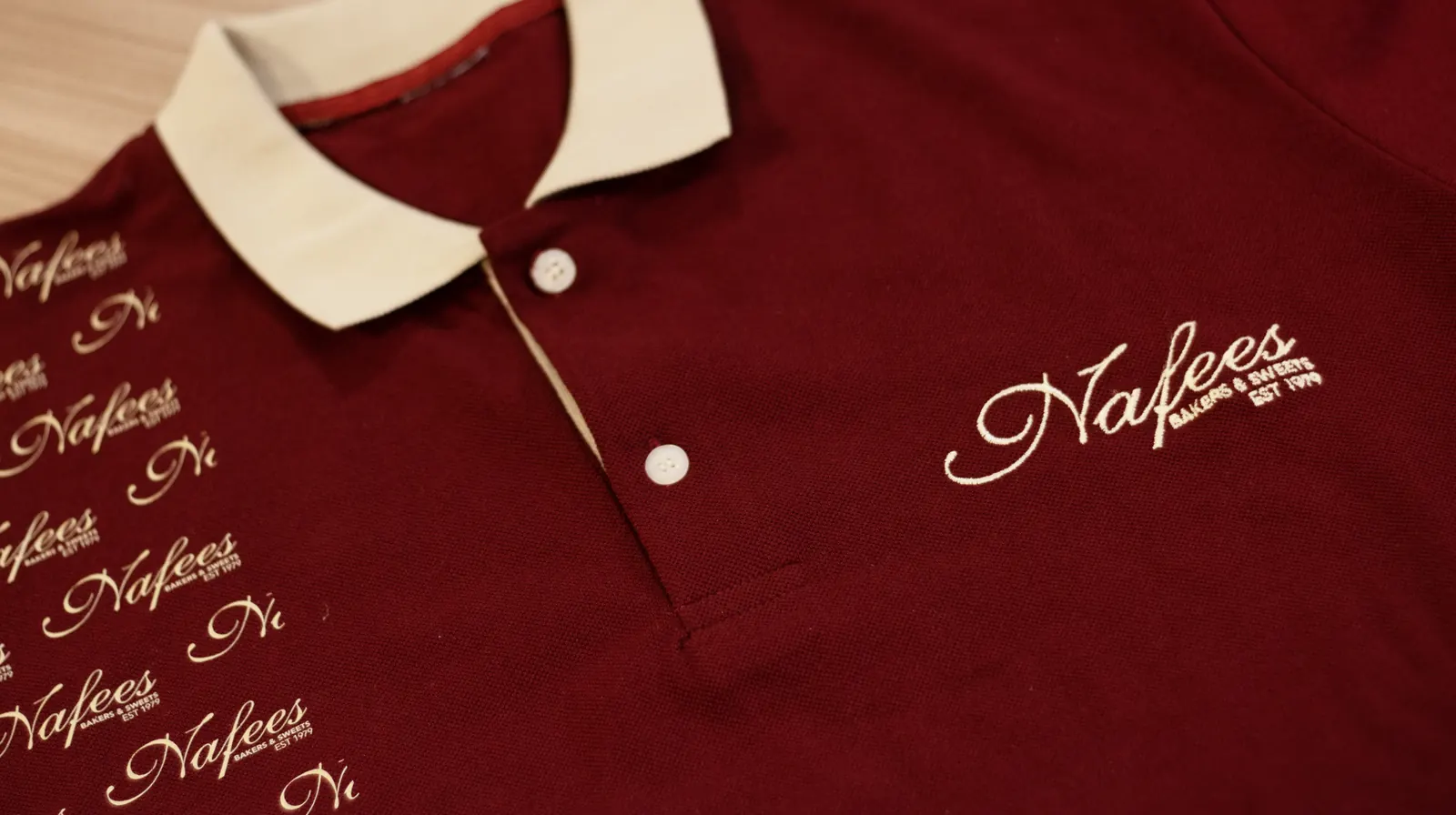 Close-up of a branded polo shirt collar produced by BR Apparel in Bradford