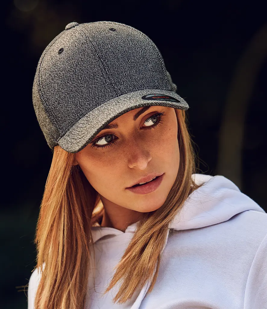Model wearing a plain grey marl curved peak cap