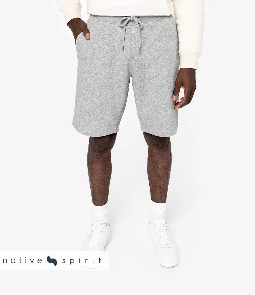 Model wearing plain grey marl sweat shorts with a drawcord waist