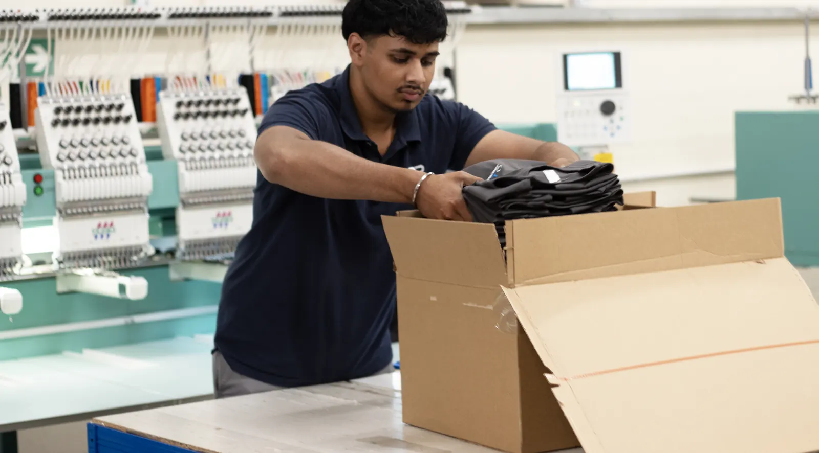 BR Apparel warehouse stocking branded workwear for Wakefield logistics customers