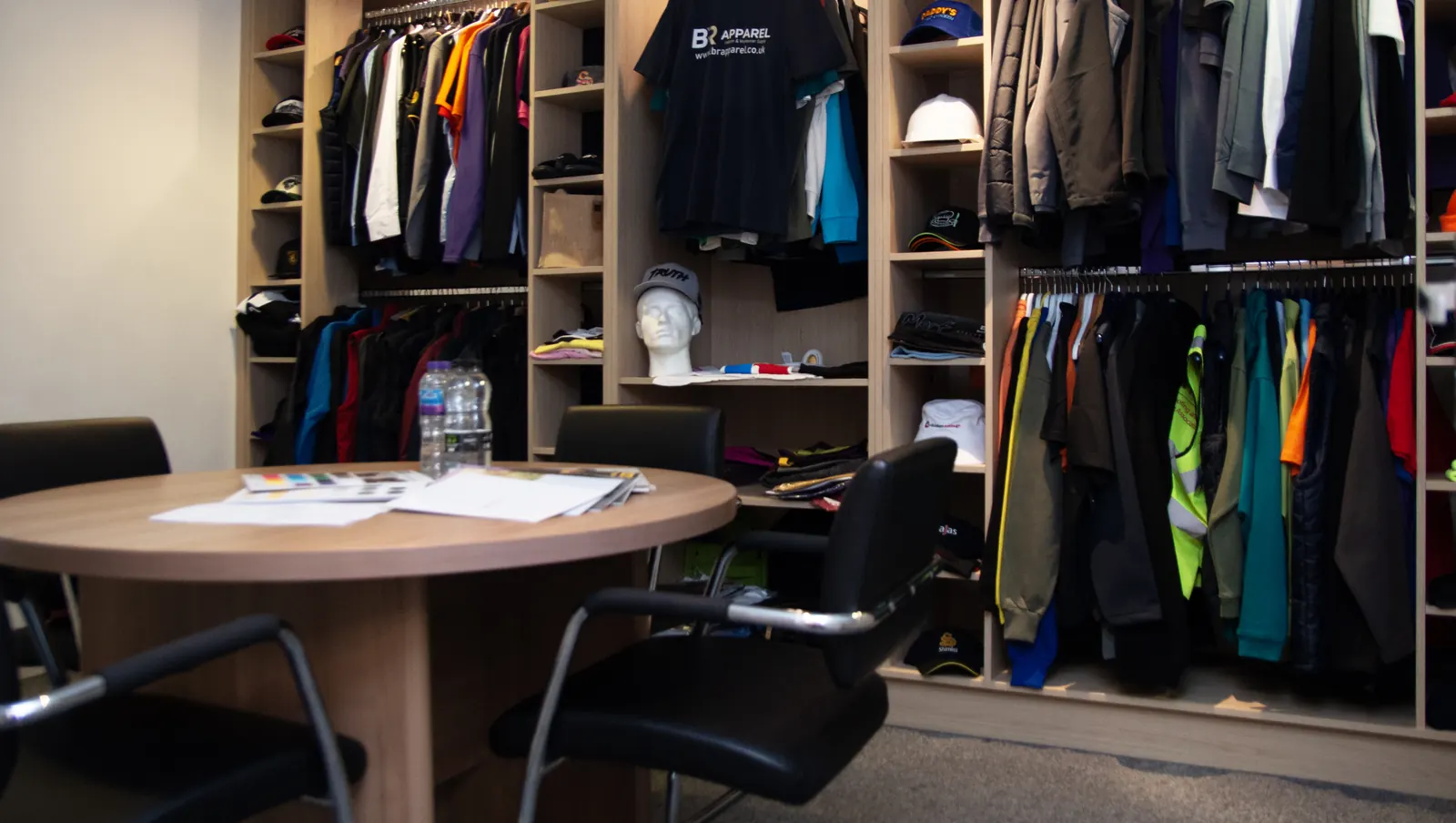 BR Apparel garment showroom with uniform samples and consultation area